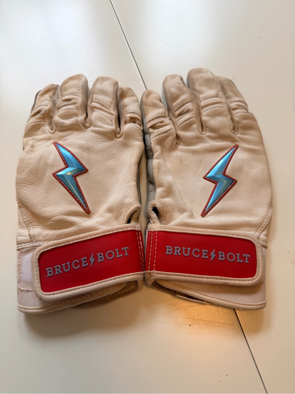 Bruce Bolt short cuff Miami Series batting gloves mens Small white/blue